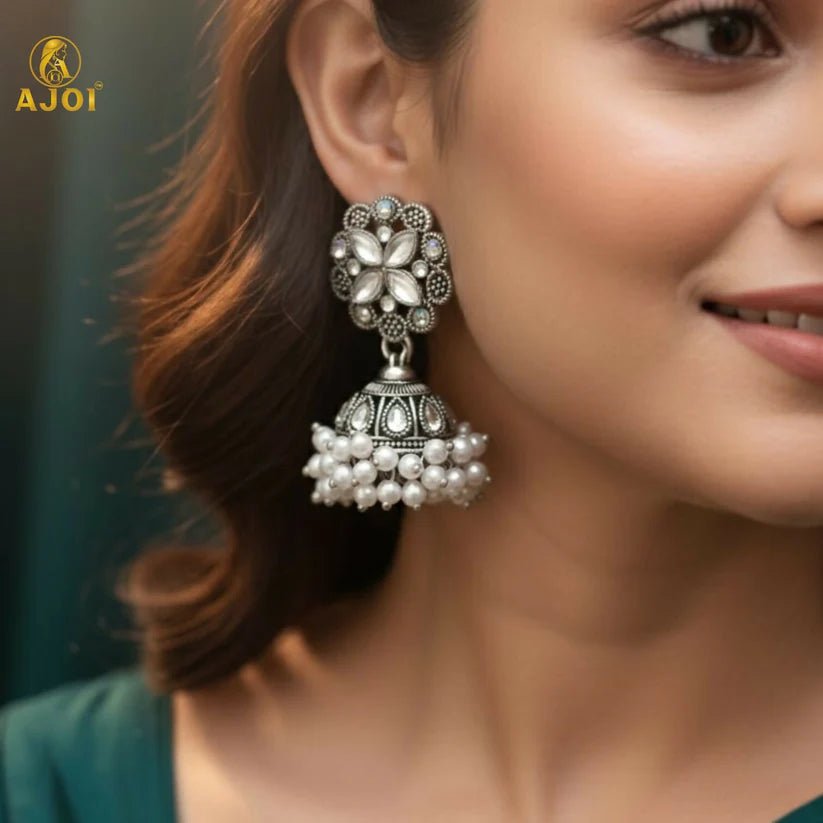 Elegant Silver Oxidized Floral Jhumka Earrings with Pearl Drops - Kala Jewels